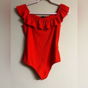 Another orange onesie! This one is off the shoulders